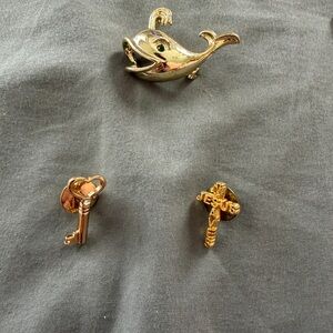 Charming Gold Tone Brooch and Pin Trio
